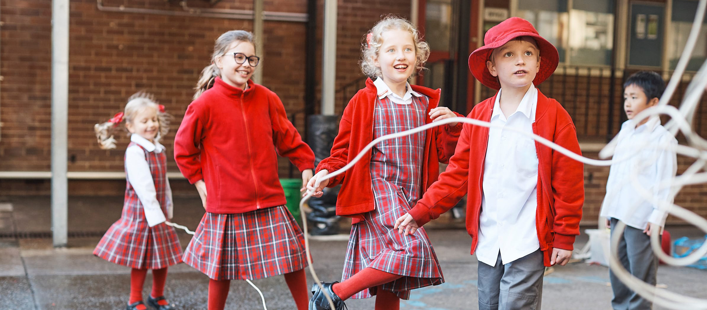 School Children Playing with Skipping Rope